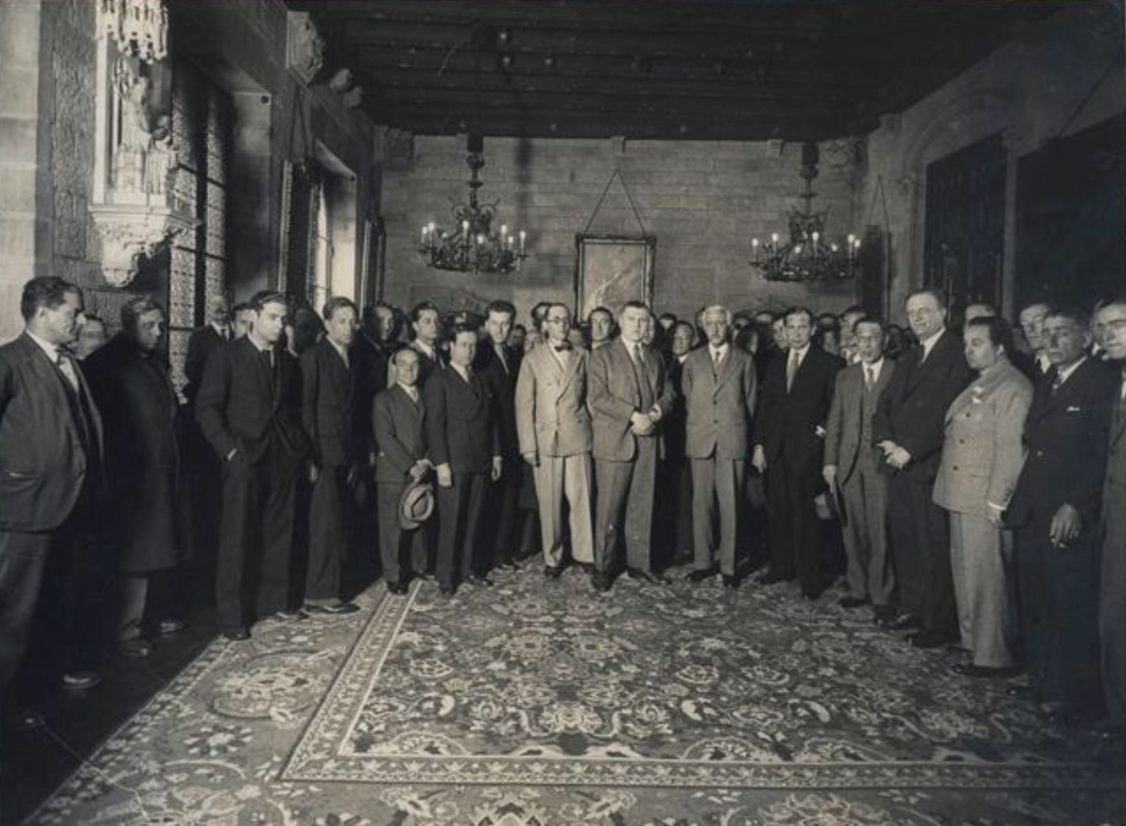 President Francesc Macià receives an international delegation of architects on 30 March 1932 at Saló Verge de Montserrat, including Le Corbusier,
